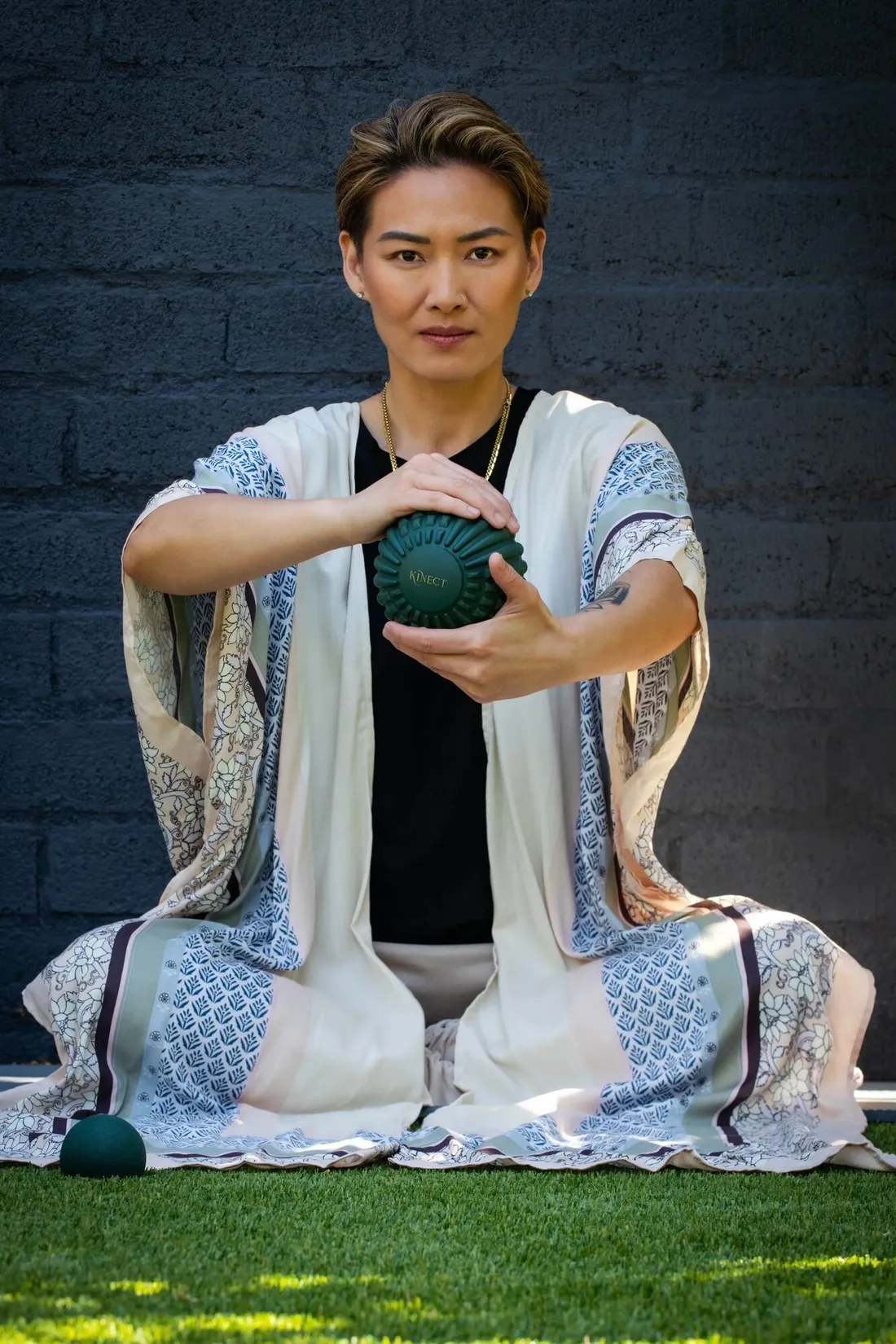 Angie Wong holding a KINECT™ ball